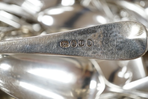 A quantity of assorted 18th century and later silver flatware various dates, makers and patterns, including table spoons, table forks, dessert forks teaspoons, butter knife etc. and an 800 teaspoon